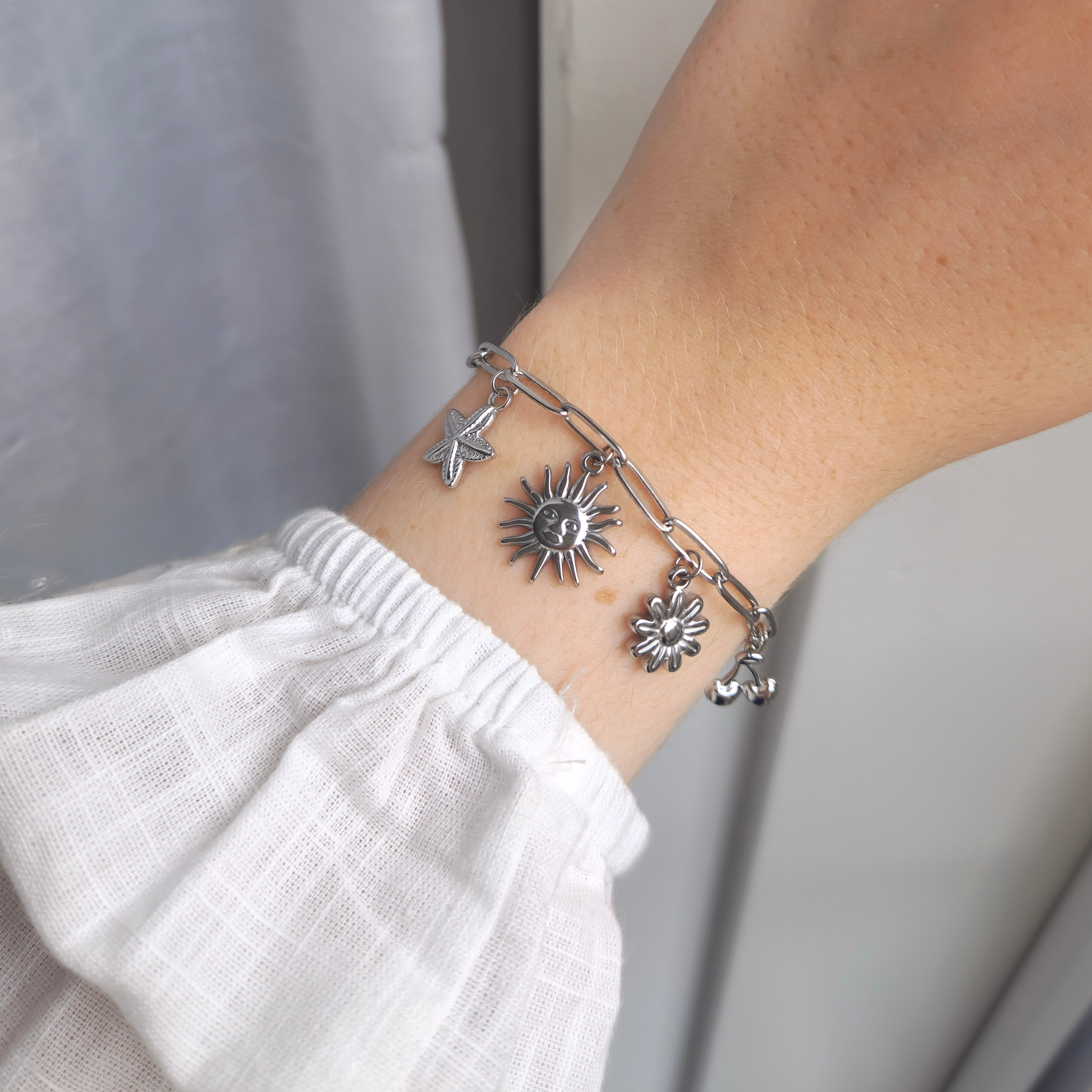 Sunkissed bedelarmband (zilver)